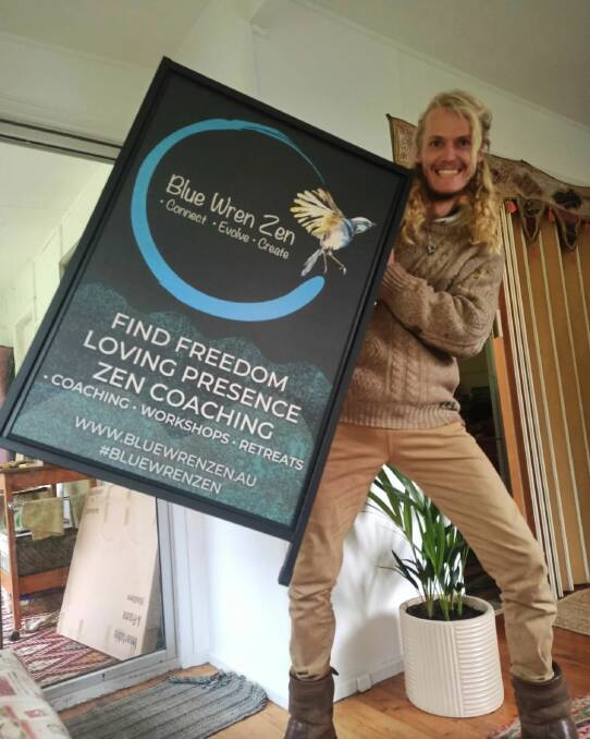 Marenn Sagar said he was very excited to attend the Wanderer Festival in September 2022 and set up his market stall with his new signs. Photo supplied.