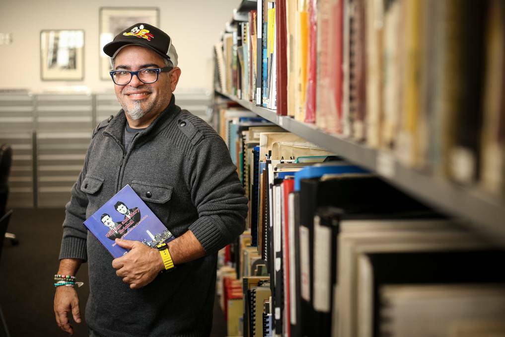 Historian Cesar A Becerra holds a copy of a biography, The Brickell Family, written by Beth Brickell, a distant relative of William and Mary Brickell. He is pictured at the Albury Library Museum in 2019. Picture: James Wiltshire
