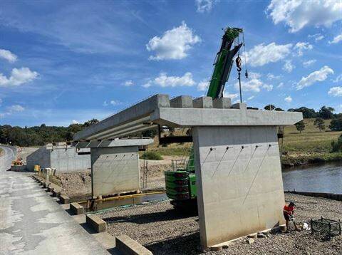 Concrete beams being placed onto Towrang bridge. Picture: supplied