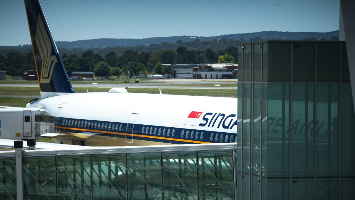 A Singapore Airlines jet at Canberra Airport. Picture: Sitthixay Ditthavong 