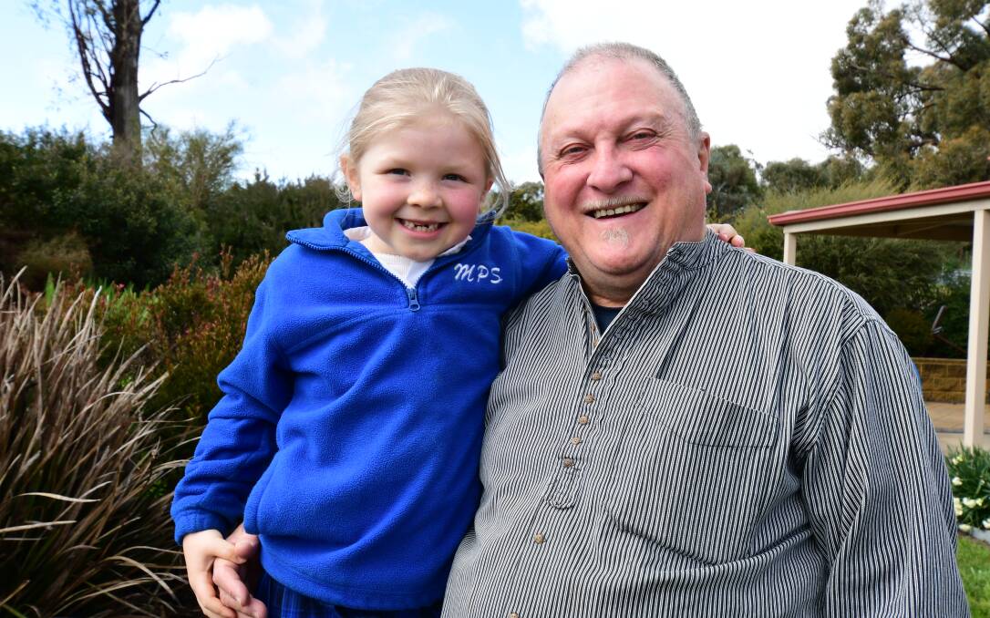 Willow Whittaker, left, with her grandfather, Jim Whittaker in Orange. Picture by Jude Keogh.