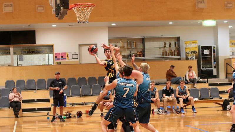 Tigers' Mitch Falcke angling himself for the layup against Goulburn. Picture by Greg Turner 