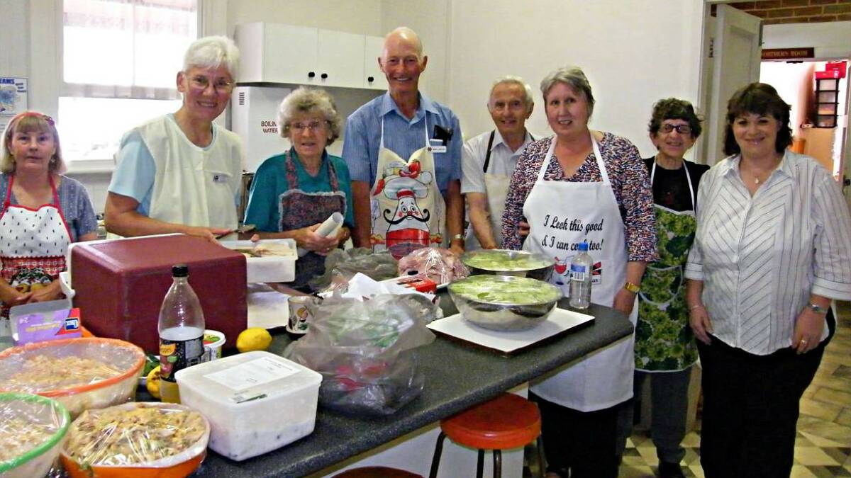 Volunteers at a previous Uniting Church Christmas day lunch. The kitchen has since been renovated. File picture