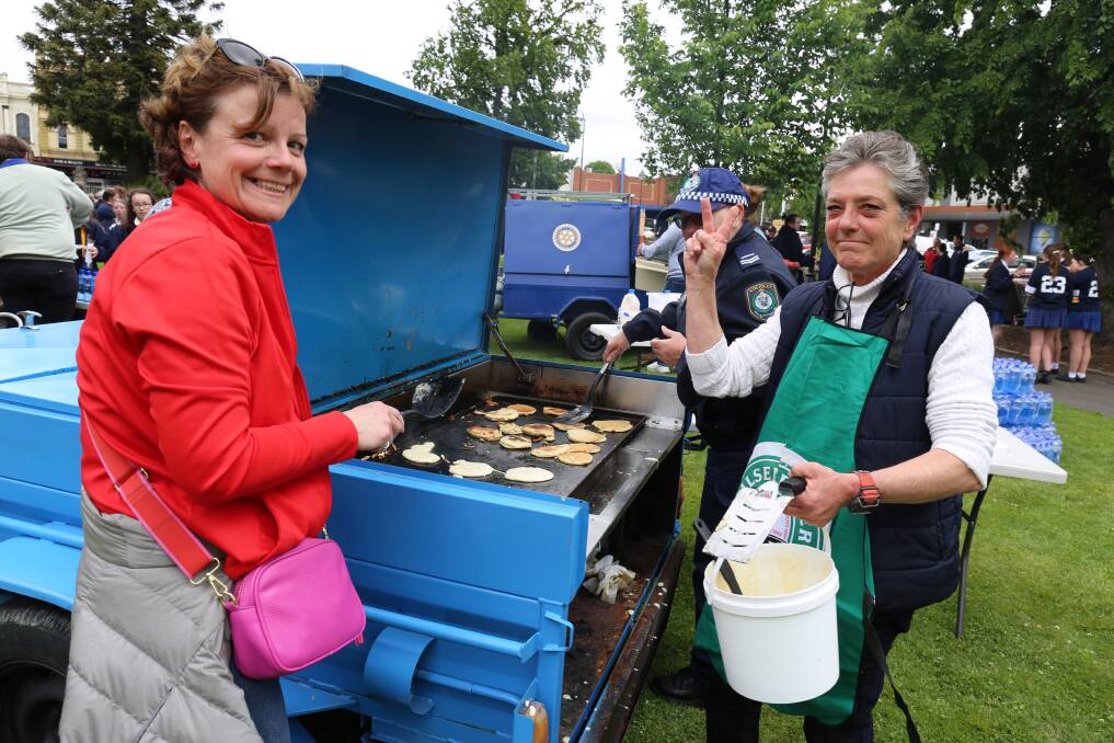 Simona, Lou and Trish cooking pancakes for the walkers. Picture by Sophie Bennett