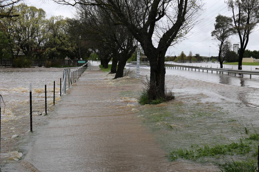 Bungonia Road is inundated with water on Sunday morning. Picture by Jacob McMaster