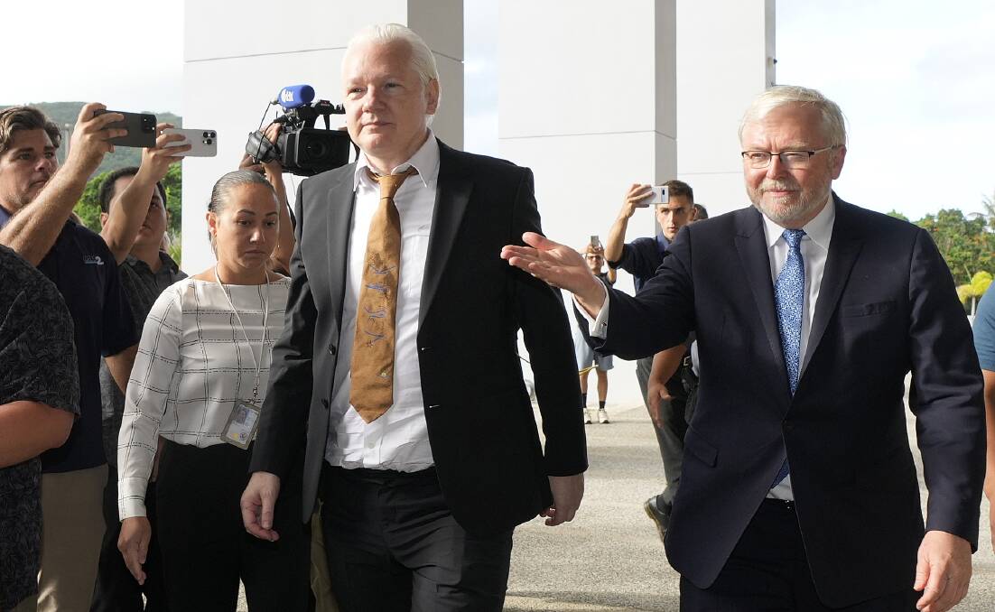 WikiLeaks founder Assange, centre, arrives at the United States courthouse in Saipan, Mariana Islands, June 26 2024. (AP Photo/Eugene Hoshiko)