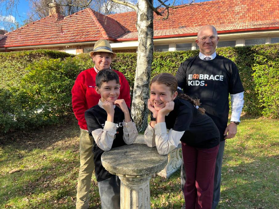 Berrima District Children's Foundation secretary Shauna Monkerud with St Thomas Aquinas principal Anthony McElhone and Year 6 students Isaac and Charli. Picture by Sally Foy