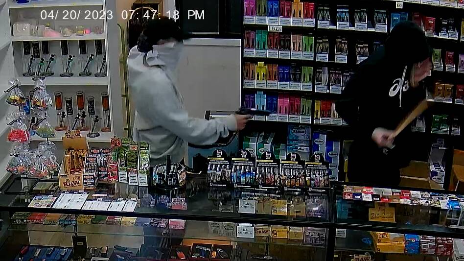 A still from the footage of the alleged robbers in the Wynnum store. Picture via Queensland Police