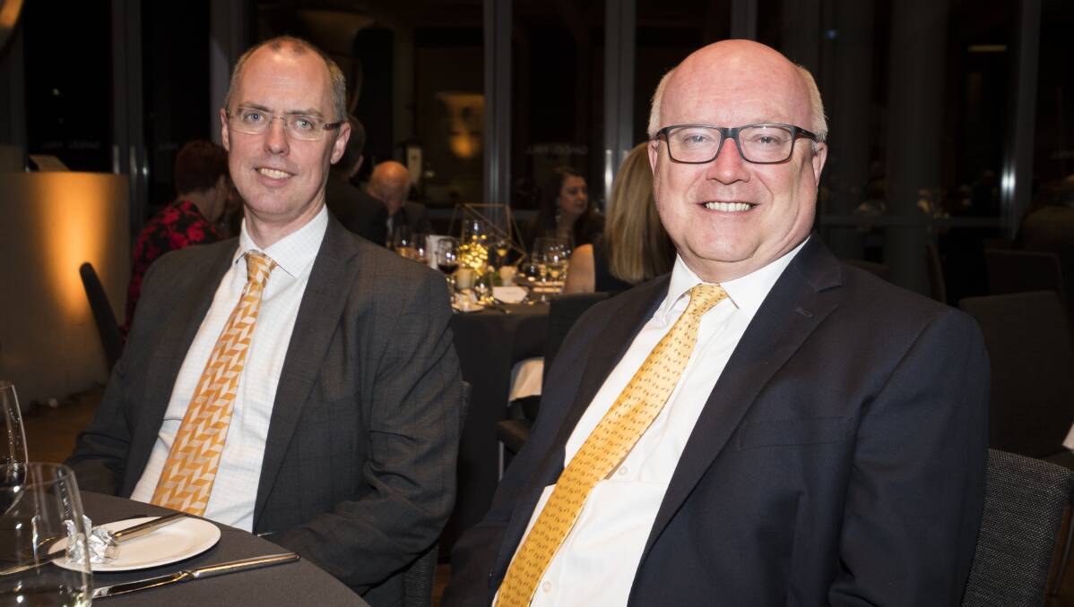 Solicitor-General Stephen Donaghue, left, at a function with former Attorney-General George Brandis. Picture by Dion Georgopoulos