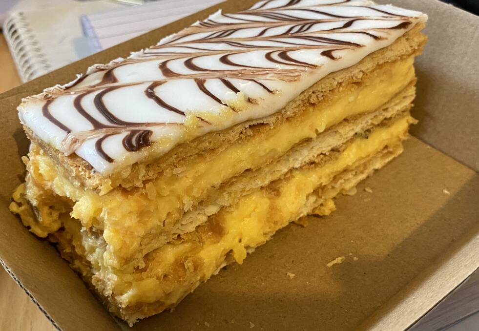 Kiama's Parfait Patisserie produces plenty of amazing treats, including this tasty mille-feuille style of vanilla slice. Picture by Glenn Ellard.