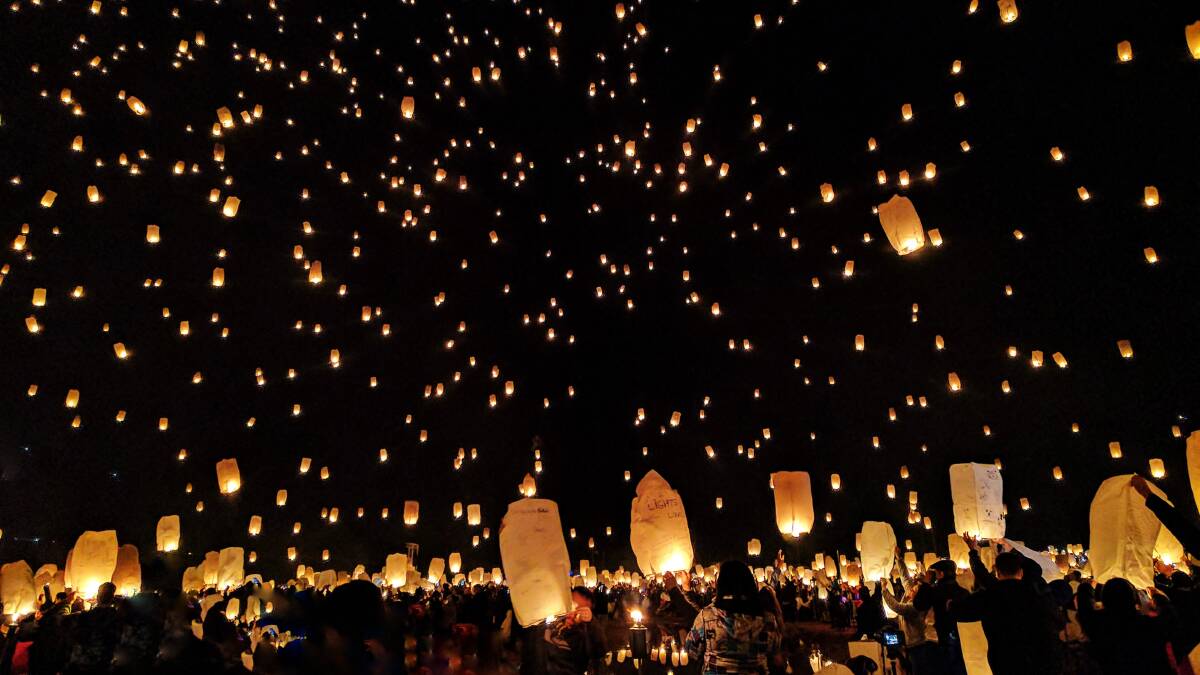 Light a lantern for a loved one. Image by Pexels.