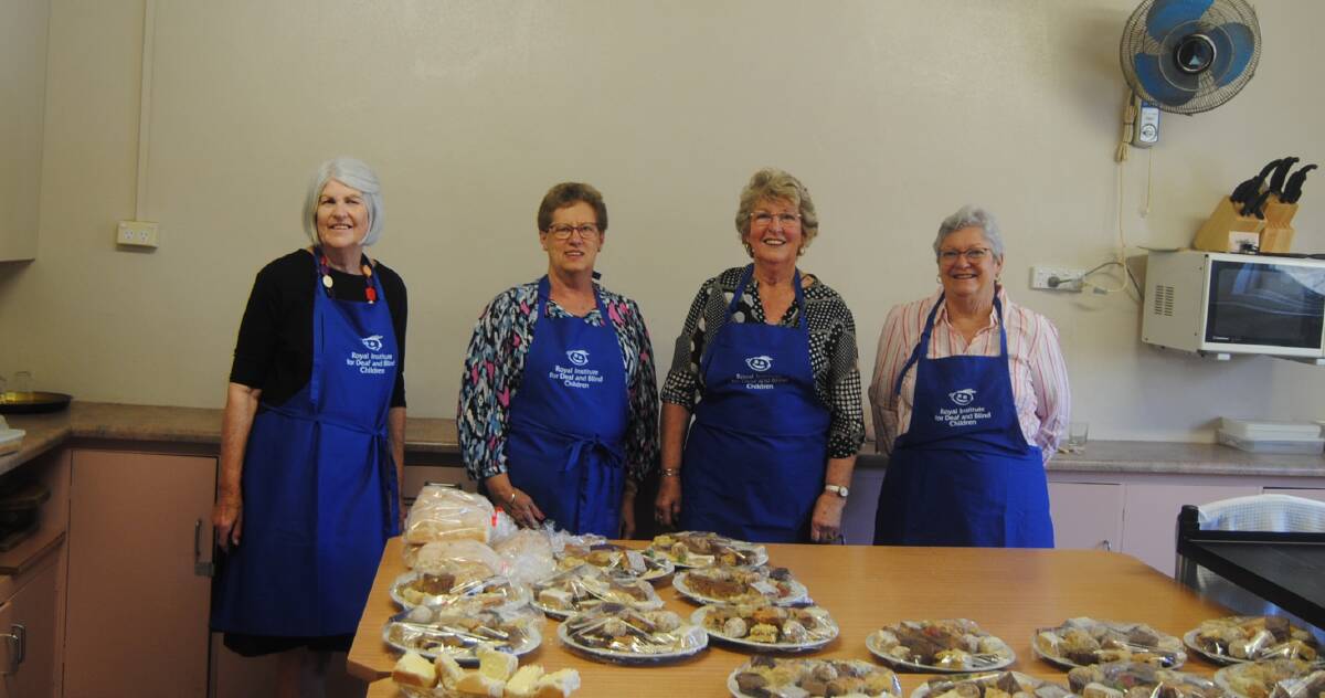 Lantern Club Members Lynne Makin, Annette Cave, Lynne Howe and Rhonda Cave prepare an afternoon tea for attendees of the event. Image by Jacqui Lyons.