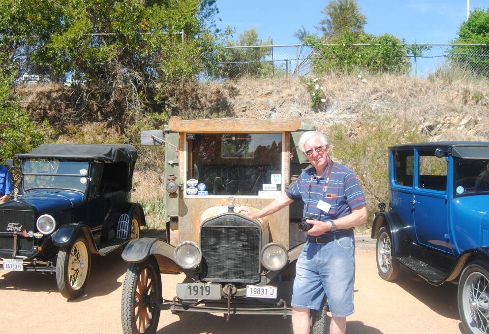 Model T Ford Club organiser John Vickery beams as he stands next to one of the more 'classic Ford models'. Images by Jacqui Lyons.
