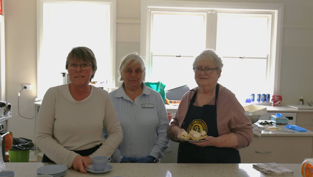 CWA members Nicole Annison, Karen Fyfe and Denise Crouch made more than 70 scones for the day. Image by Jacqui Lyons.