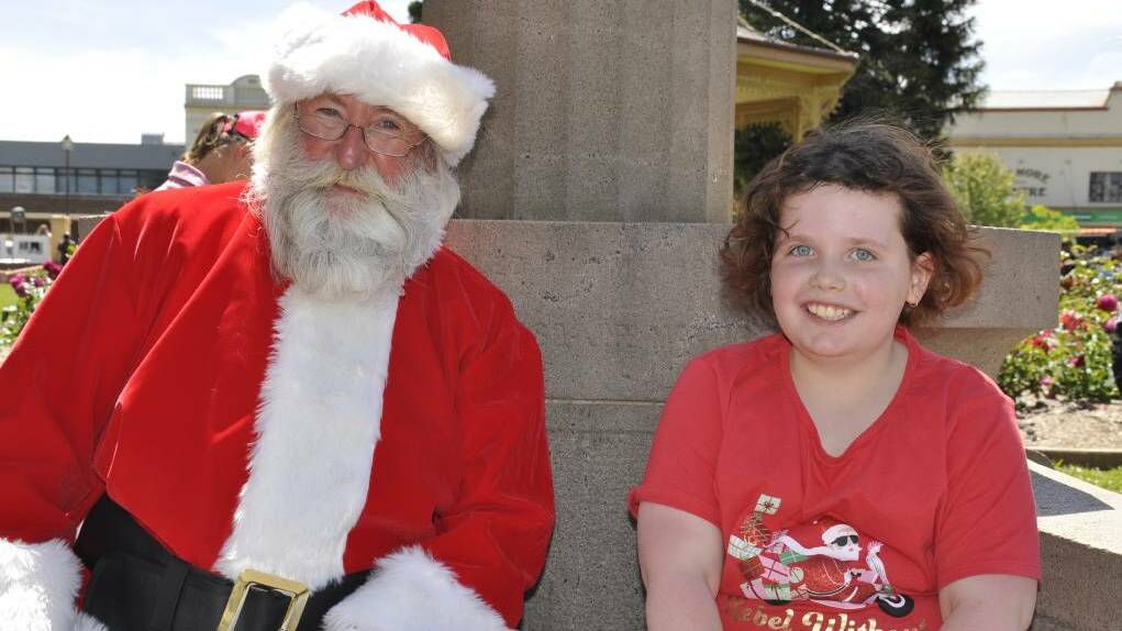  Madison Barnes from Canberra had a lovely chat with Santa at Pictures and Popcorn in the Park on Saturday. Madison was spending time with her Goulburn grandmother at Pictures and Popcorn 2022. Picture by Louise Thrower.