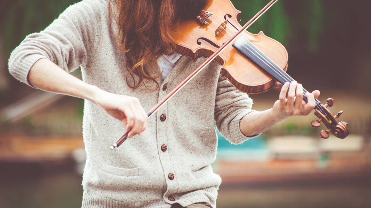 Learn more about orchestra these school holidays. Image by Pexels.