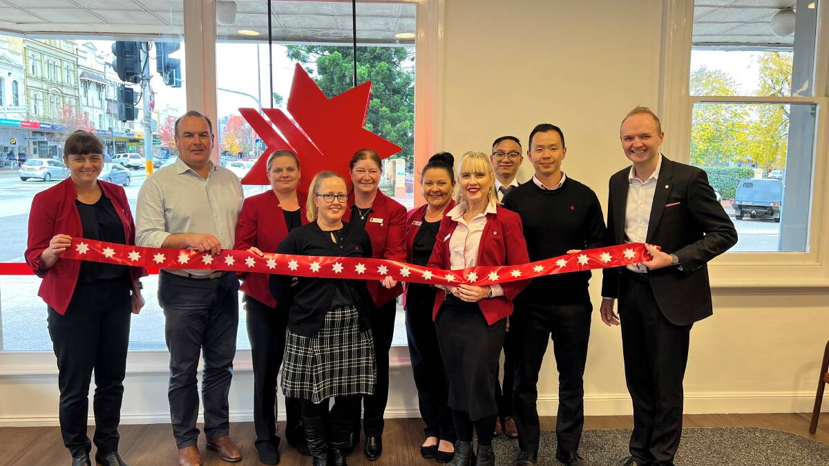NAB team members Kristy Davis, Joshua Loader, Kylie Wiggins, Michelle Kemp, Wendy Todd, Yvonne Anderson, Alicia Stanizzio, Thomas Zhang, Todd Carruthers, Matthew Leddy attend the reopening of the branch. Image supplied. 