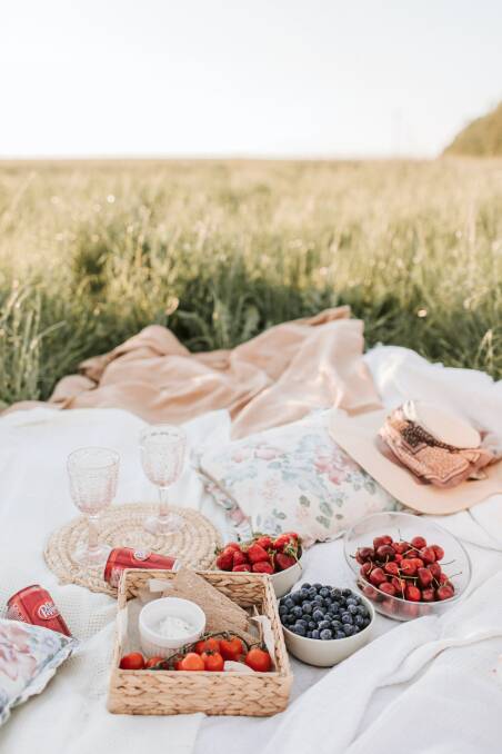 Pack a picnic and enjoy nature this weekend. Image by Pexels.