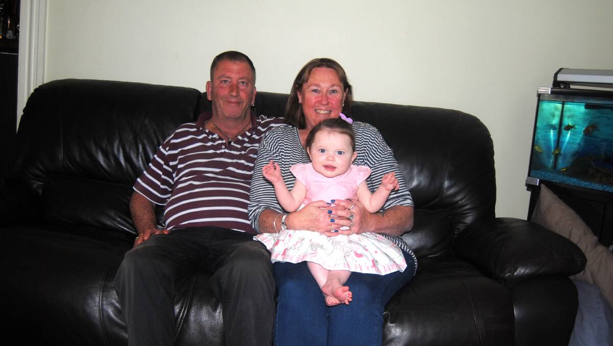 Grandparents Wayne and Anne and their granddaughter Alarah. Image by Jacqui Lyons. 