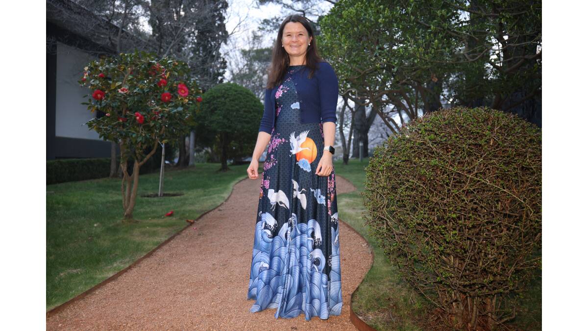 Guest Susan Bultitude, of Fisher, at the reception in a Japan-inspired dress. Picture by James Croucher