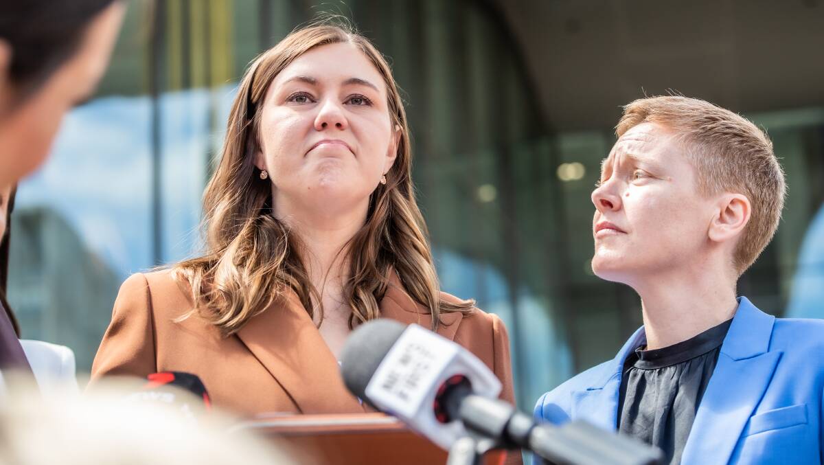 Victims of Crime Commissioner Heidi Yates, right, looks on as Brittany Higgins addresses reporters last year. Picture by Karleen Minney