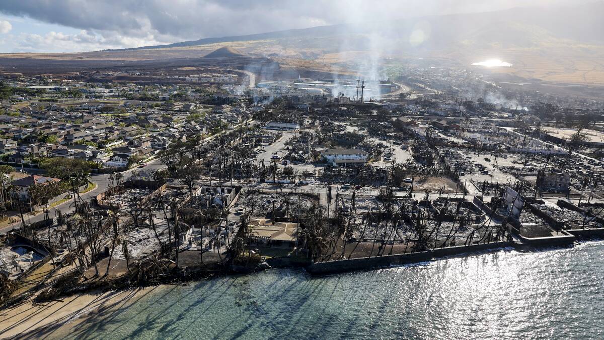 Buildings still smolder days after a wildfire gutted downtown Lahaina. Picture Getty Images