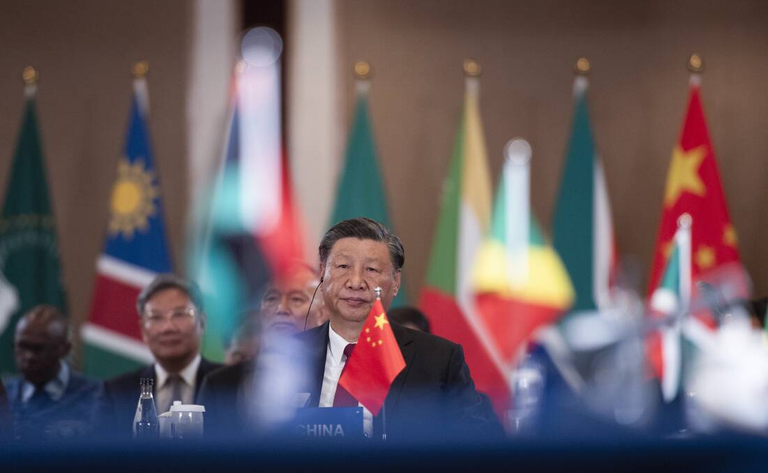 President of China Xi Jinping looks on during the last day of the BRICS Summit in South Africa last month. Picture AAP