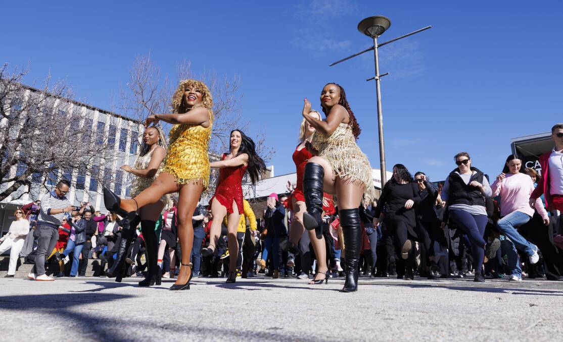 Colour and action in the Nutbush flash mob in Civic Square. Picture by Keegan Carroll