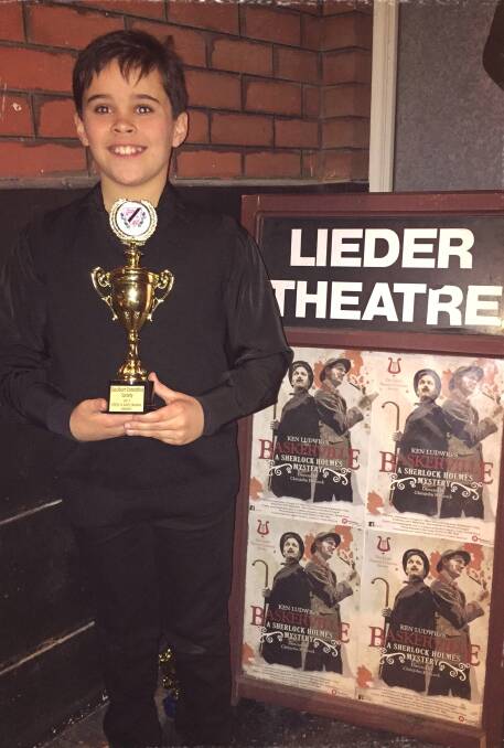 ACHIEVEMENT: Joshua Arnold 11, at the Lieder Theater during the first week of the Goulburn Eisteddfod. Photo: Supplied. 