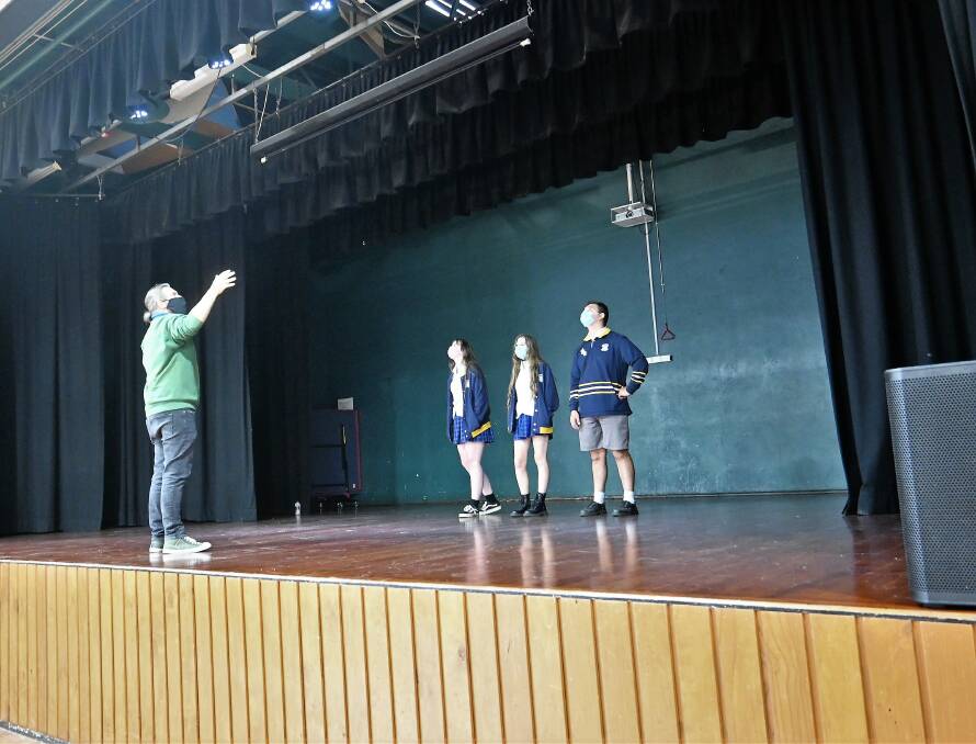 music teacher David Robertson speaking to his Year 12 VET Entertainment Class about how the new lighting truss will be set up and how it will work. Picture: Supplied.