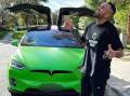 Nick Kyrgios with his Tesla that was stolen in 2023. Picture Instagram