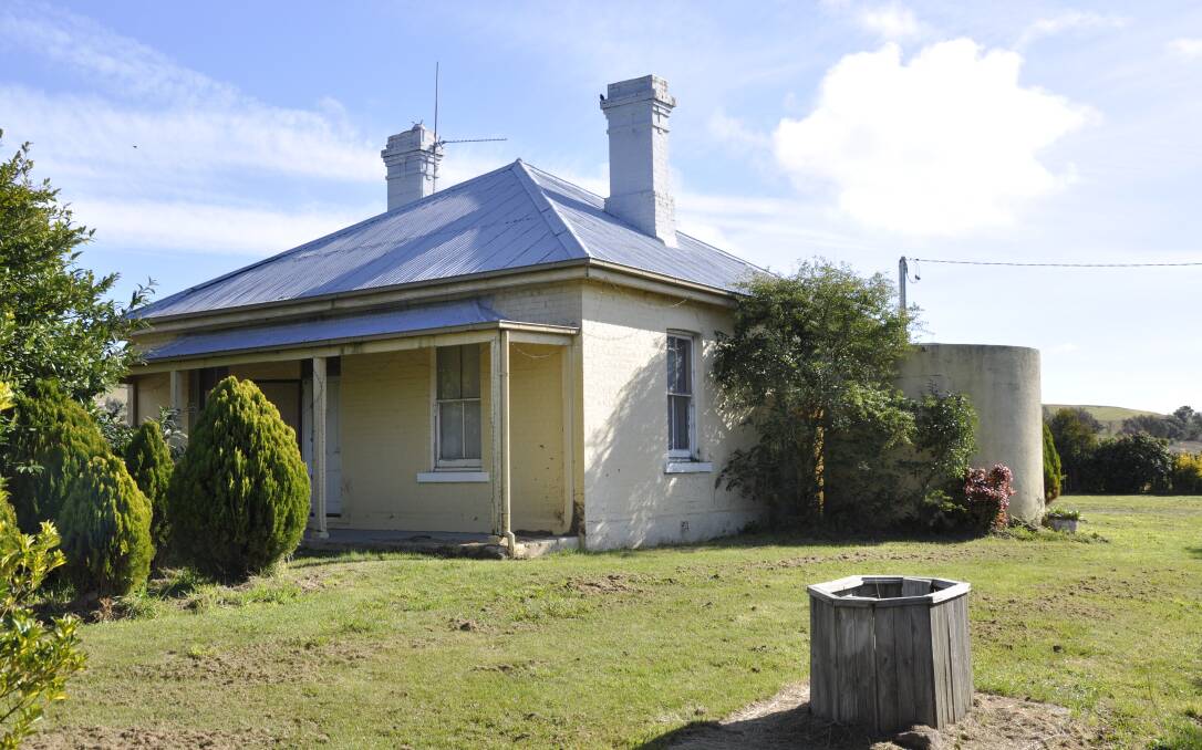 A former station master's cottage at Tarago is not listed on the State Heritage Regiser, unlike the nearby railway station. Transport for NSW wants to demolish the cottage. Picture by Louise Thrower.