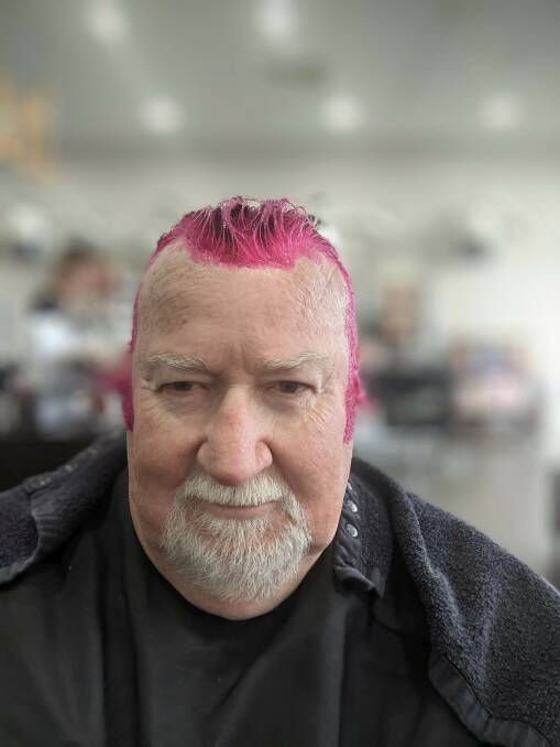 Goulburn's Cut and Curl hairdresser, Kate Abbey was happy to turn Peter Kenny's hair pink. Picture supplied. 