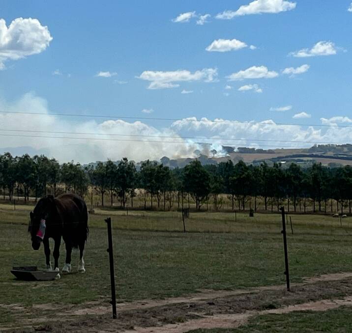 The Gurrundah Road fire west of Goulburn broke out at about 2pm Saturday. Gurrundah Road resident, Mel Floyd, said at 3.45pm the outbreak was 1km from her home but an aerial water bomber appeared to be gaining the upper hand. Picture by Mel Floyd.