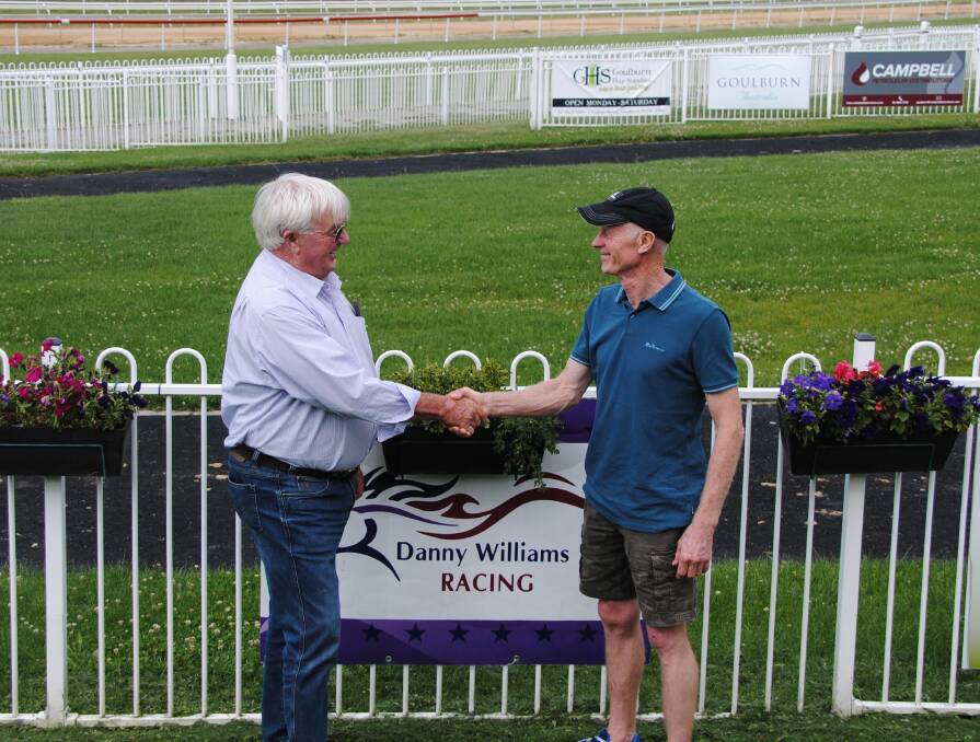 Goulburn and District Racing Club chairman, Ken Ikin, with trainer, Danny Williams, at an earlier race meeting. Picture by Burney Wong.