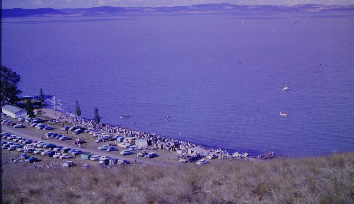 Some 2500 people watched the swimming race across Lake George on March 12, 1961. picture courtesy History Goulburn.
