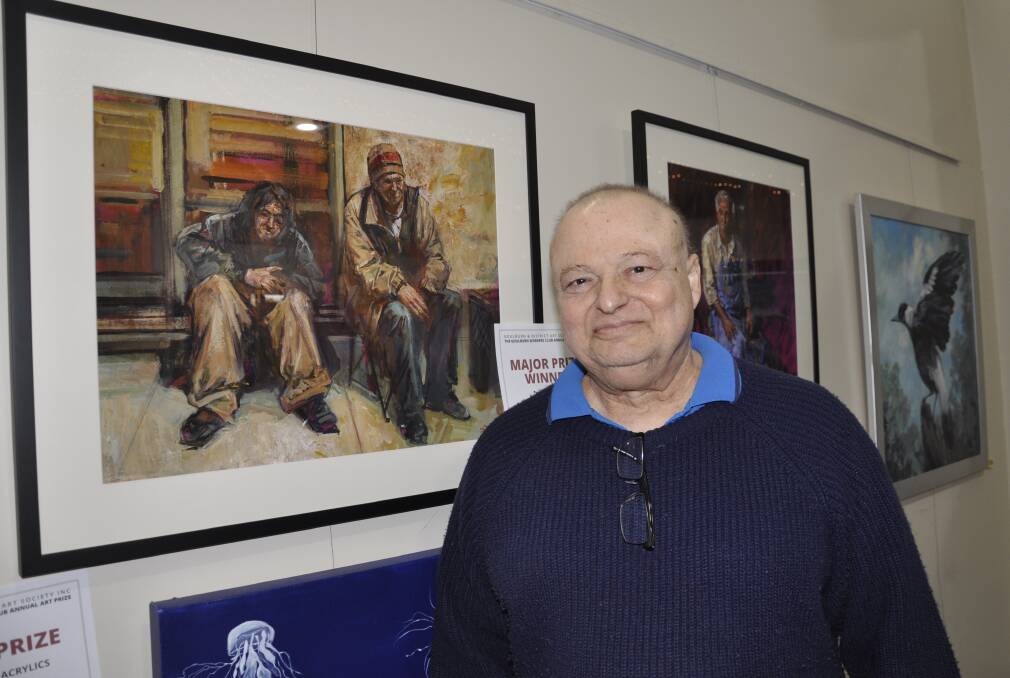 Goulburn artist Stavros Papantoniou passed away on Saturday, leaving a rich legacy to the community. He's pictured here last October with his winning Goulburn Workers Club Annual Art Prize work, 'Home Sweet Home.' Picture by Louise Thrower.