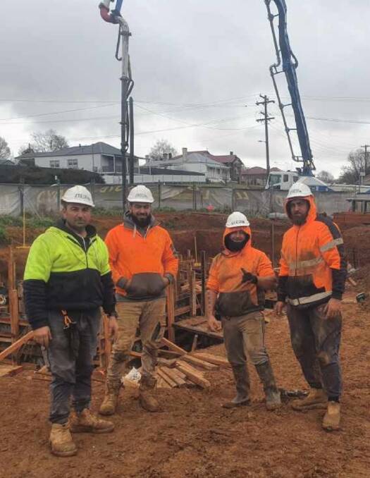 Workers on the Crookwell multipurpose aquatic and activities centre site in August, 2022. Picture supplied.