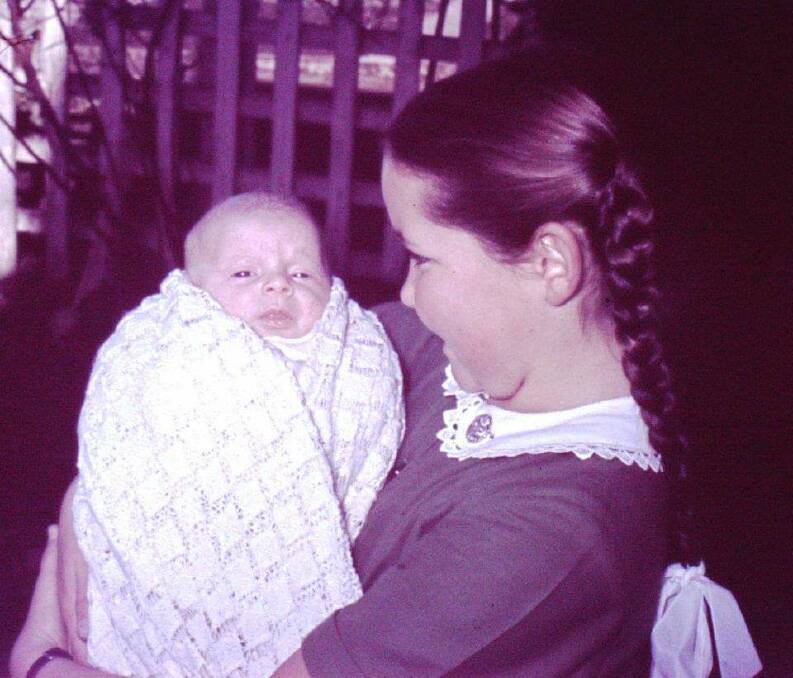 Louise Allison and cousin Kerrie remained close all their lives. Louise is pictured holding Kerrie in 1957. Picture supplied.