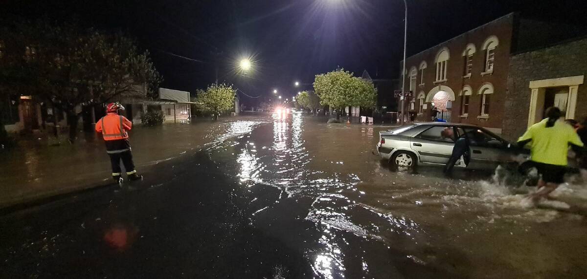 Gunning's main street was inundated on Monday night. Picture by Ant Lewis.