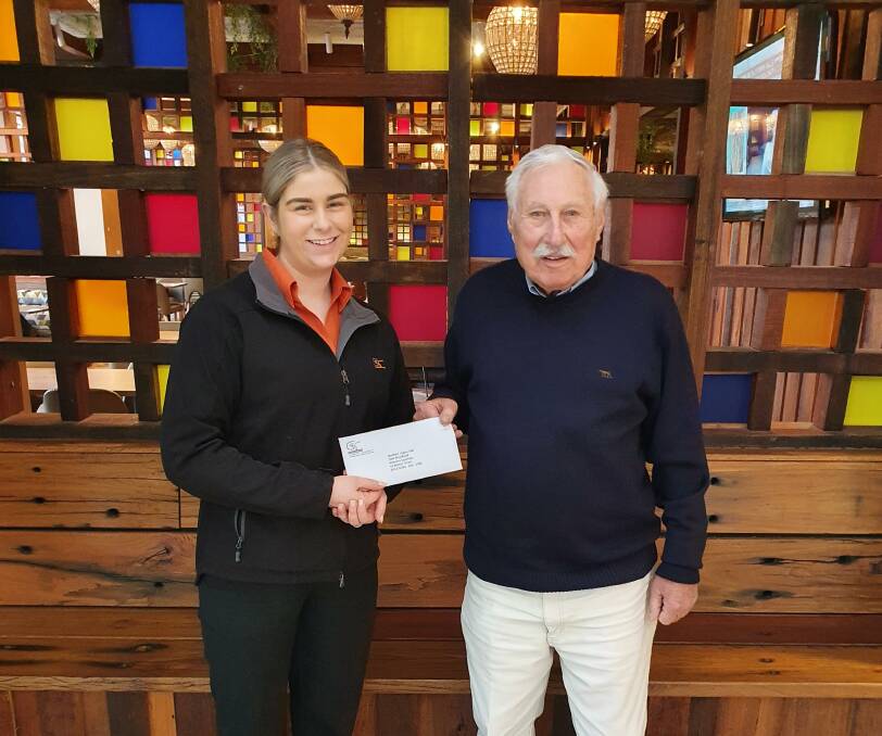 Goulburn Soldiers Club promotions officer, Emma McColl, was happy to hand over a $5000 cheque to Legacy appeals committee chairman, Ron Stamm. Picture supplied.
