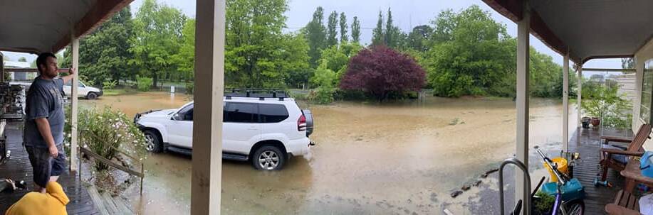 Lake Bathurst resident Rhi Sugars captured this photo of her front yard which she said "flooded in record time." The adjacent Braidwood Road was flooded.