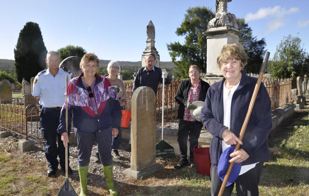 Corrective Services community projects overseer, Kevin Twaddell, with Friends of Goulburn's Historic Cemetery volunteers Lyn Brown, Daphne Penalver, David Stevenson, Kim Baker and Linda Cooper at Saint Saviour's cemetery. Picture by Louise Thrower. 