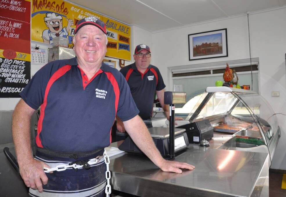Bill Murray, pictured with son Shane, has retired from the butchery trade after 49 years. Picture by Louise Thrower. 