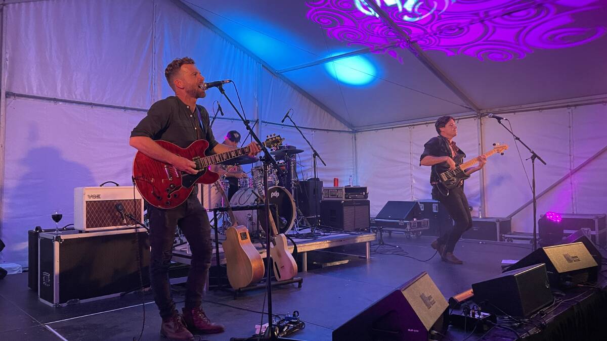 Owen Campbell and the Cosmic People performing on the outdoor Railway Bowling Club stage at the 2022 blues festival in Goulburn. Picture by Sophie Bennett