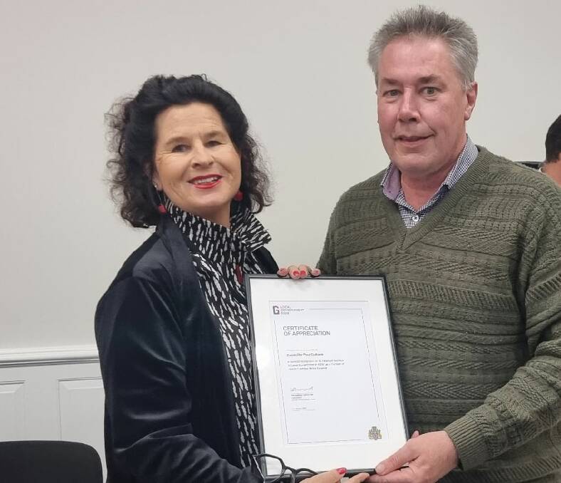 Mayor Pam Kensit recognised Cr Paul Culhane for 15 years' service to Upper Lachlan Shire Council at a recent meeting. Picture supplied.