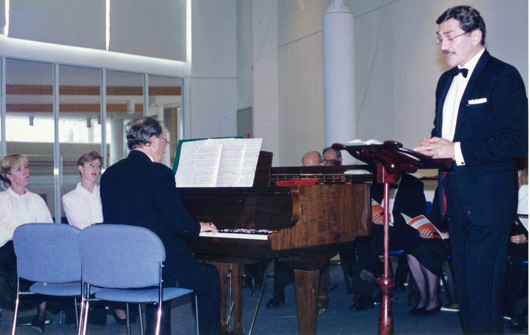Australian diplomat and tenor, John Lander, performing to music by Paul Paviour at the Goulburn Regional Art Gallery, date unknown. Picture supplied.