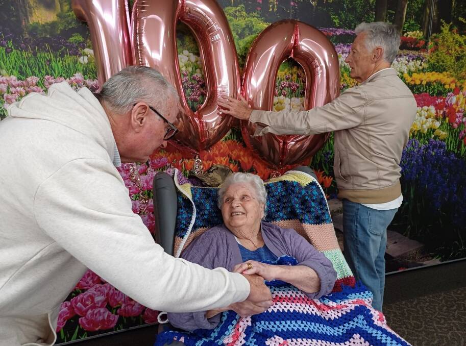 Rod and Bryan Smith helped celebrate their mother's 100th birthday at Warrigal aged care facility on Sunday, November 5. Picture supplied.