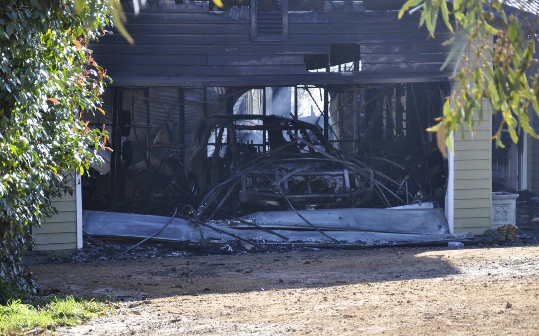A vehicle inside the Middle Arm Road property's garage was also destroyed in the fire. Picture by Louise Thrower.