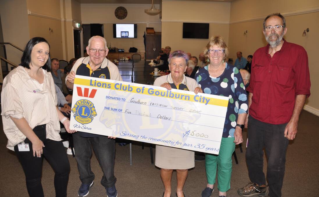 Goulburn Lions Club president, Pru Rickard (third left) and member, Bill Smith (second left) presented a $5000 cheque to Goulburn Parkinson's Support Group nurse, Laure Hogan, coordinator, Gill O'Connor and assistant coordinator, Warwick Bisset, on Thursday. Picture by Louise Thrower.